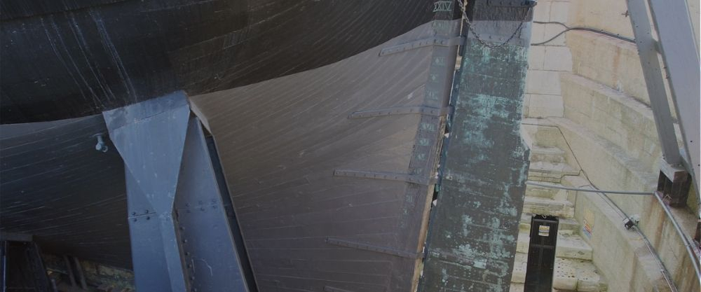 The rudder of HMS Victory is very old and weathered. 