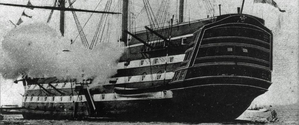 A plume of smoke due to HMS Victory firing her guns.