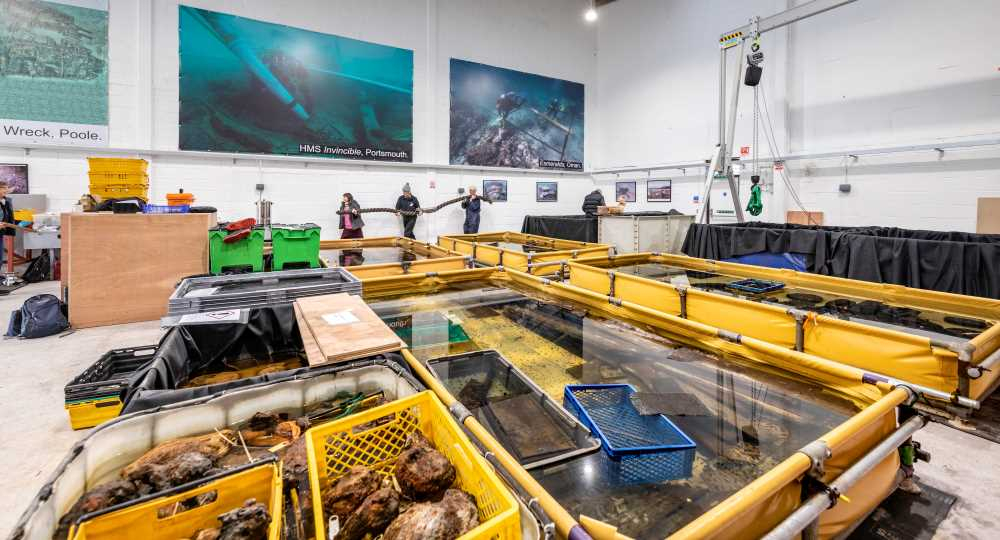 The storehouse where HMS Invincible artefacts are being stored in protective water tanks. 