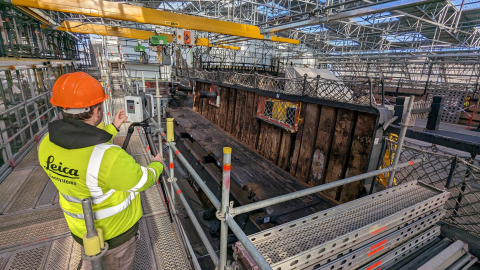 A conservator laser scanning images for the 3D model of HMS Victory.