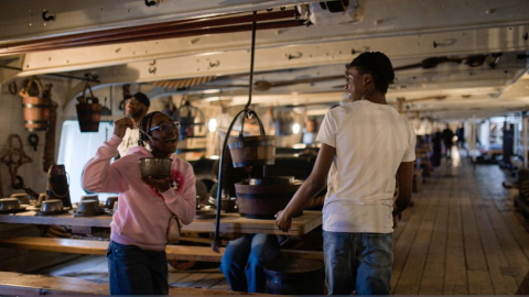 Children having fun onboard HMS Victory at Portsmouth Historic Dockyard.