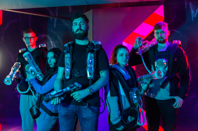 Adult group playing Laser Quest at Portsmouth Historic Dockyard