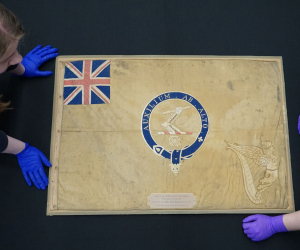 The polar Kellett sledge flag on a black background. 