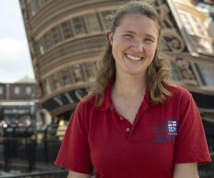 Dinnie Jay a Shipwright for the National Museum of the Royal Navy stood in front of HMS Victory