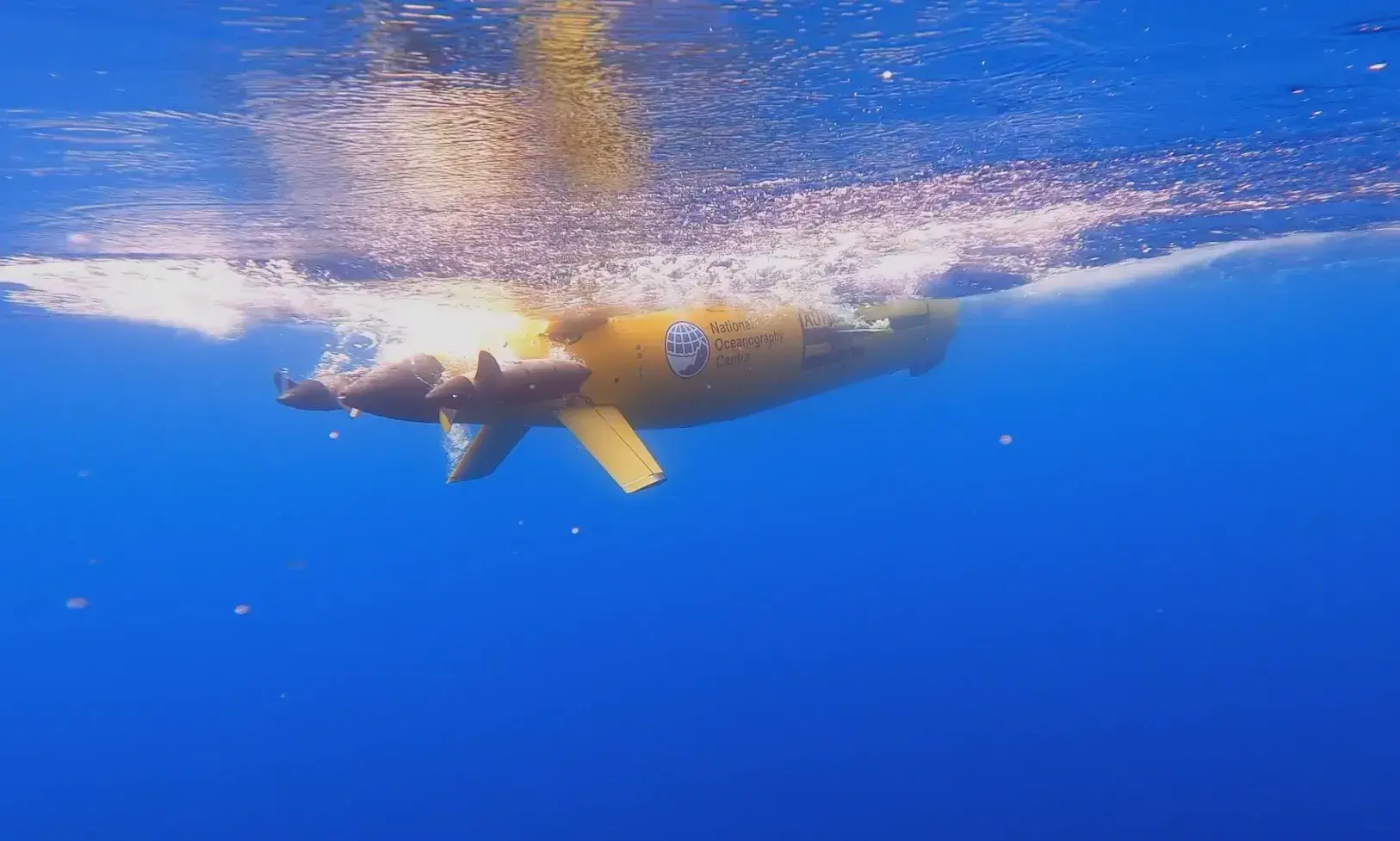 An underwater view of Boaty McBoatface, the robot submarine that helps the Royal Navy explore. 